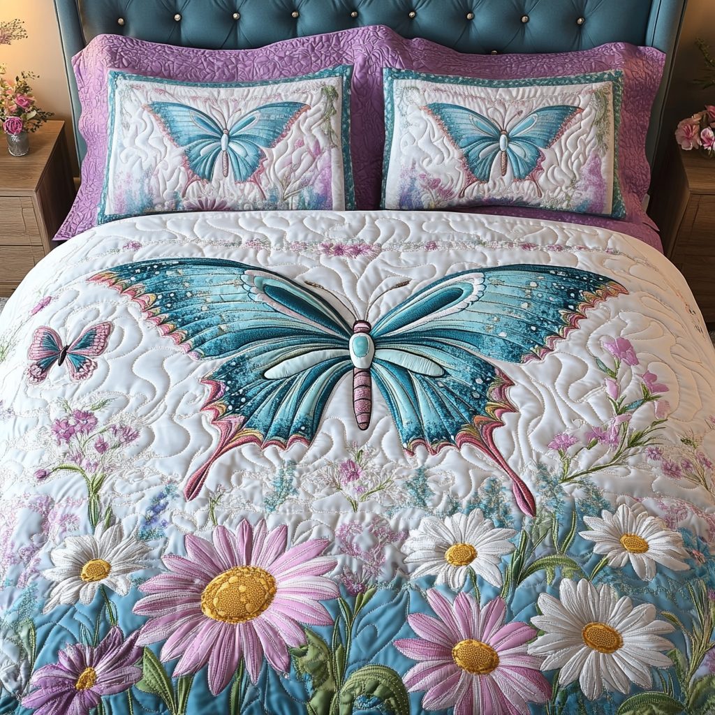 Flutter Grace quilted 3-piece bedding set on a made bed with two matching pillow shams