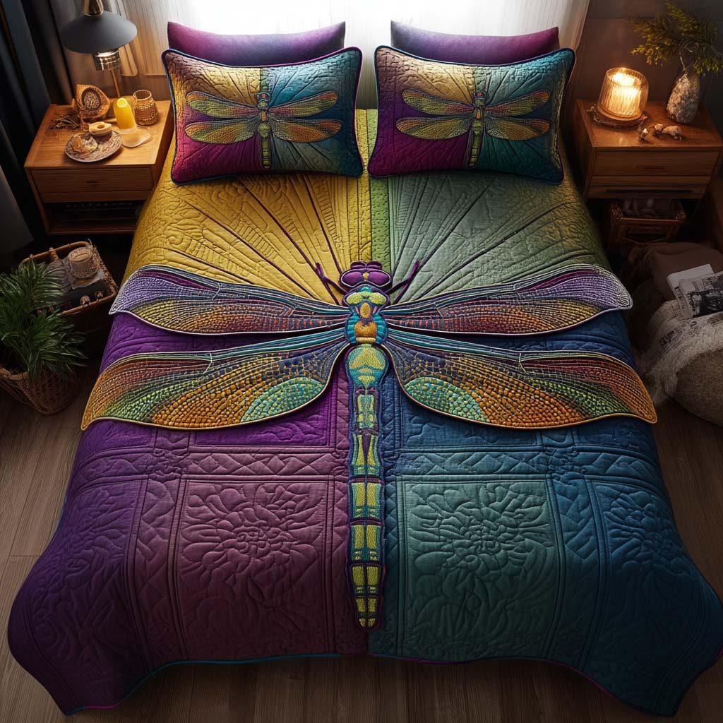 Fluttering Dragonfly quilted 3-piece bedding set on a made bed with two matching pillow shams