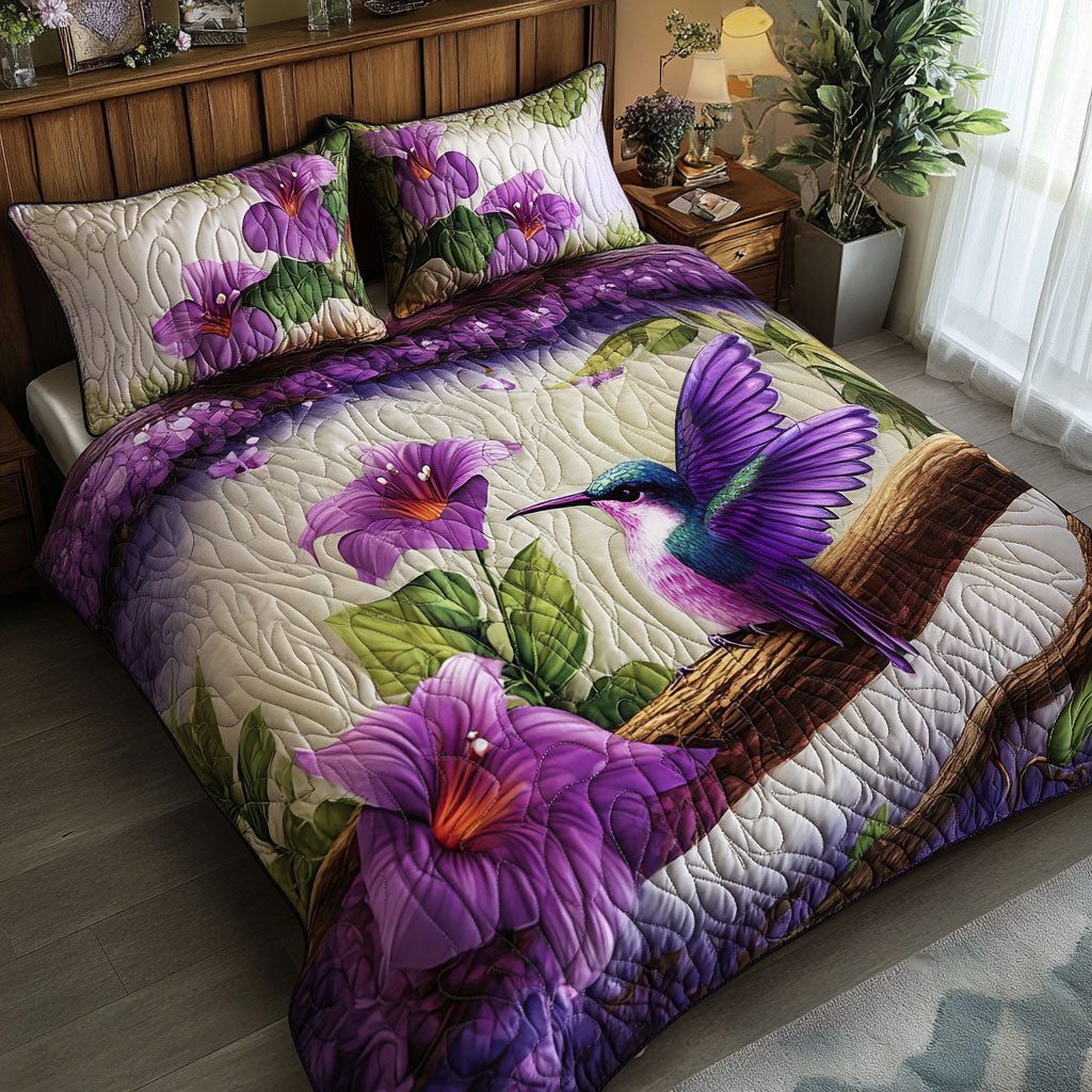 Flying Purple Beauty quilted 3-piece bedding set on a made bed with two matching pillow shams