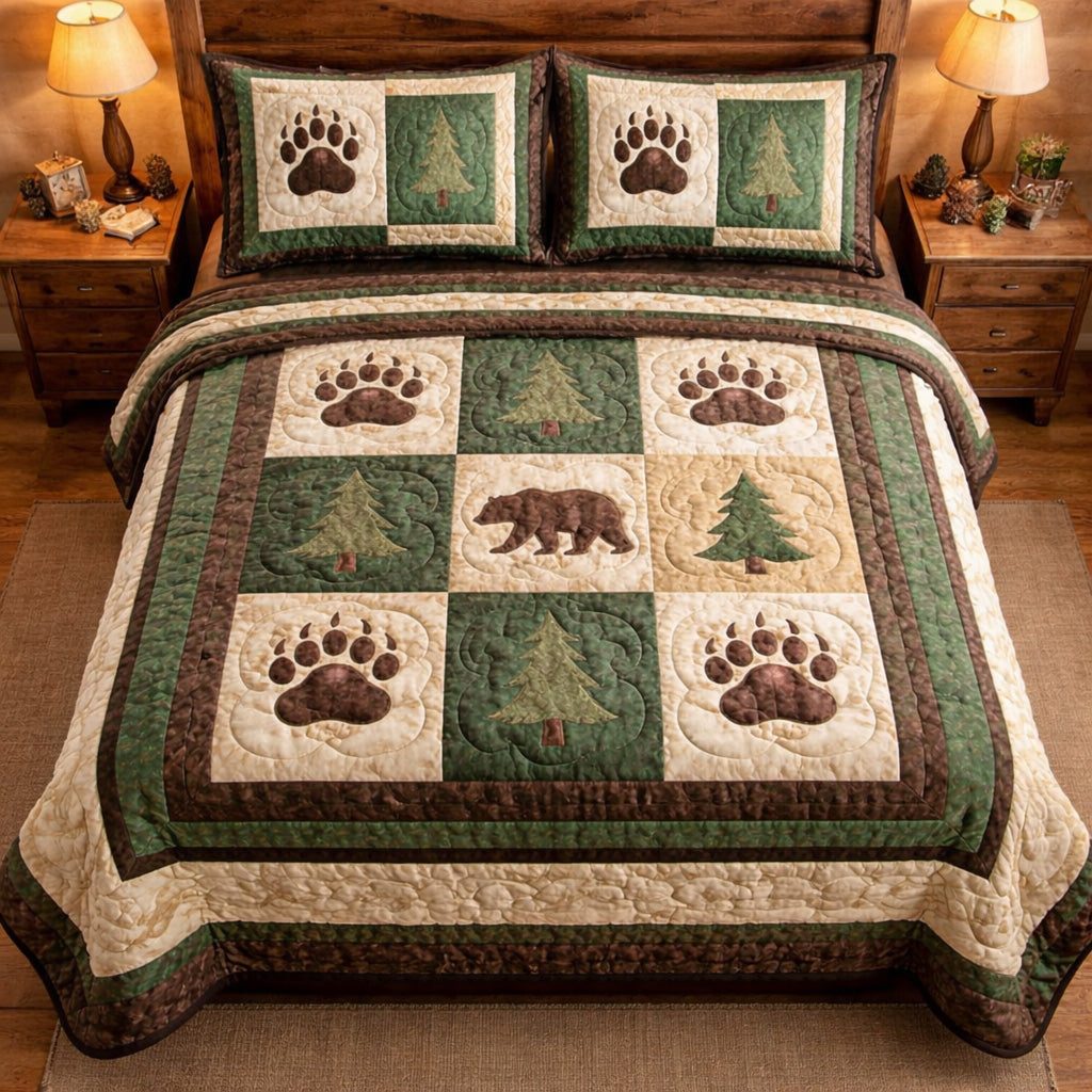 Forest Paw Trail quilted 3-piece bedding set on a made bed with two matching pillow shams