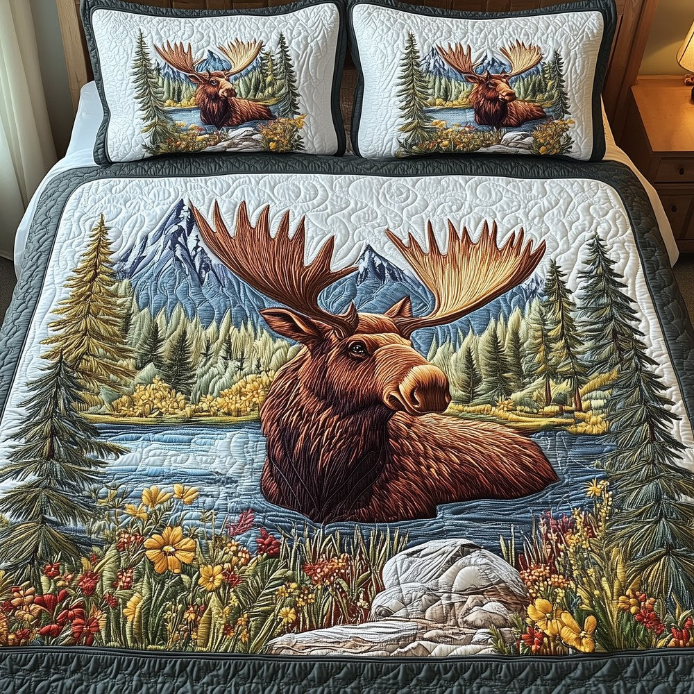 Forest Spirit Moose quilted 3-piece bedding set on a made bed with two matching pillow shams