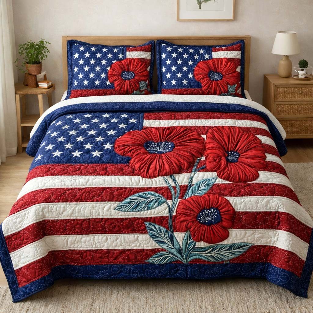 Freedom Poppies quilted 3-piece bedding set on a made bed in a warmly lit bedroom