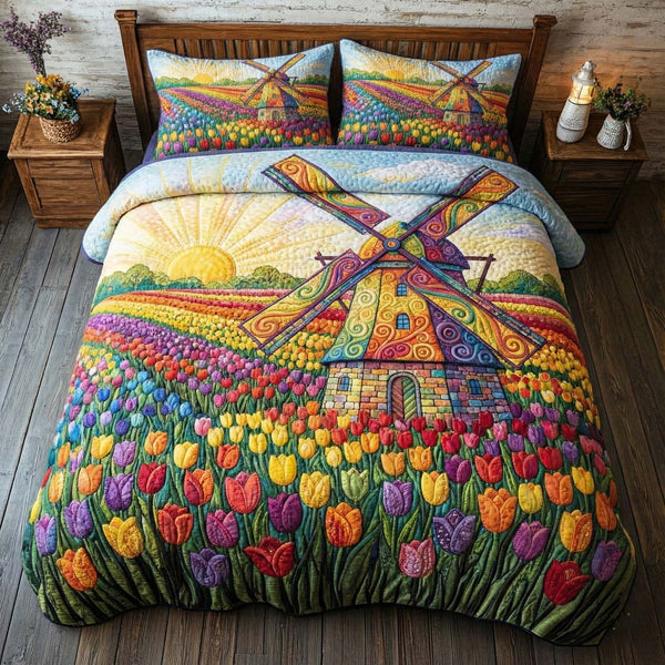 Fresh Blossoms quilted 3-piece bedding set on a made bed with two matching pillow shams
