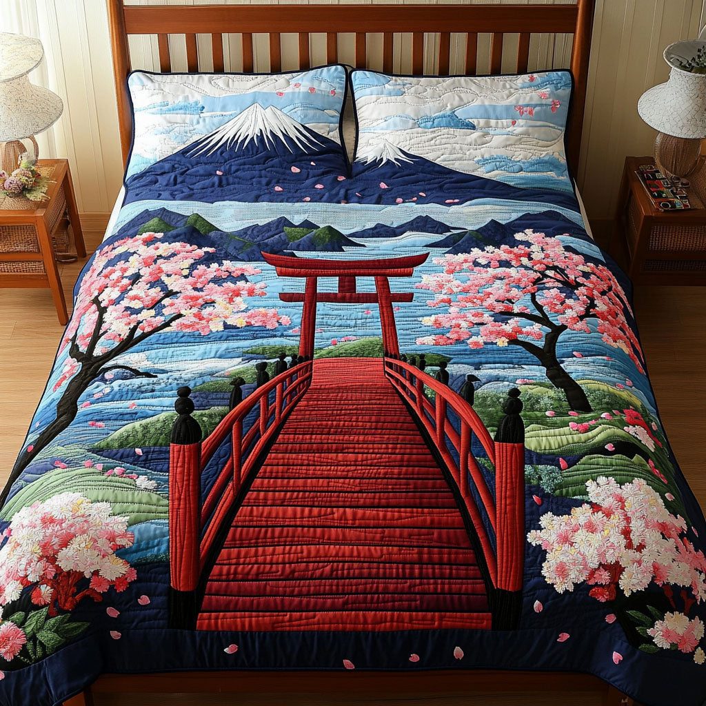 Fuji Blossom Breeze quilted 3-piece bedding set on a made bed with two matching pillow shams