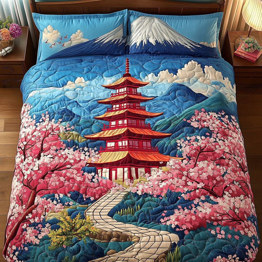 Fuji Harmony quilted 3-piece bedding set on a made bed with two matching pillow shams