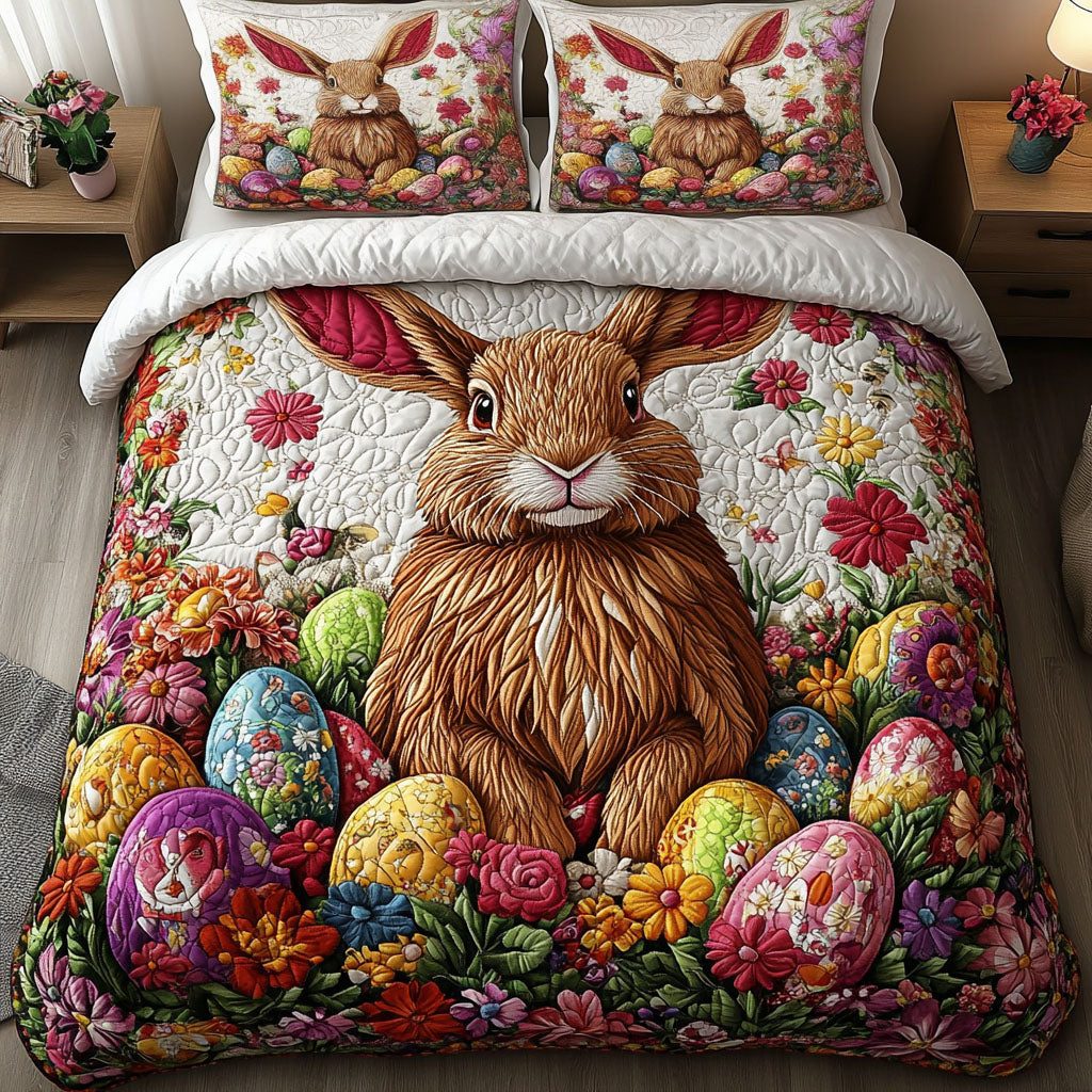 Garden Delight quilted 3-piece bedding set on a made bed with two matching pillow shams