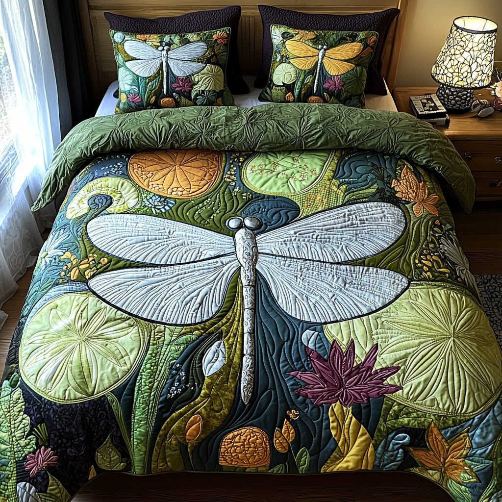 Garden Dragonfly quilted 3-piece bedding set on a made bed with two matching pillow shams