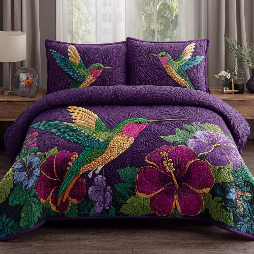 Garden Jewel quilted 3-piece bedding set on a made bed with two matching pillow shams