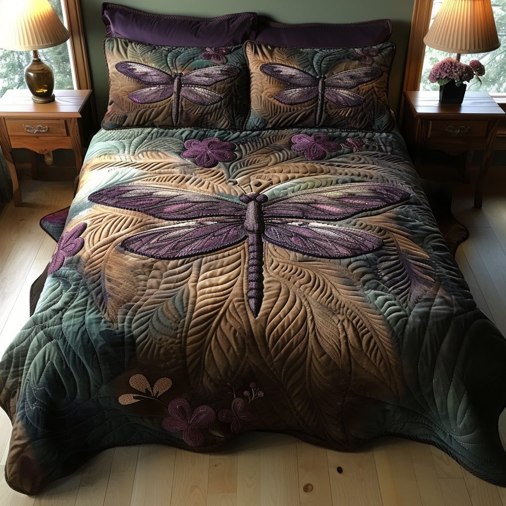 Gentle Wings quilted 3-piece bedding set on a made bed with two matching pillow shams