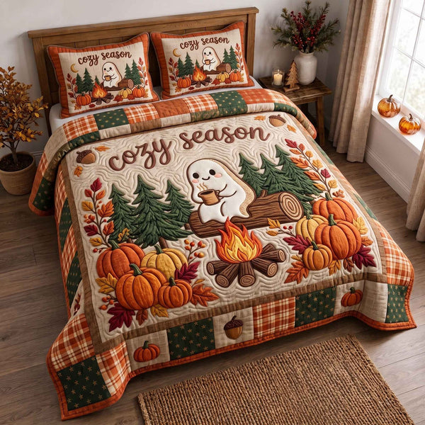 Ghost Campout quilted 3-piece bedding set on a made bed against a dark styled interior