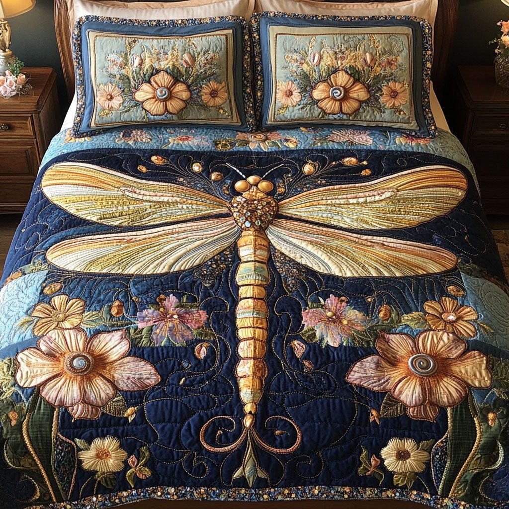 Gilded Elegance quilted 3-piece bedding set on a made bed with two matching pillow shams