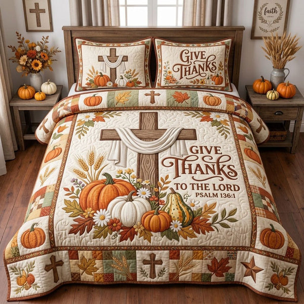 Give Thanks To The Lord quilted 3-piece bedding set on a made bed in a softly lit bedroom