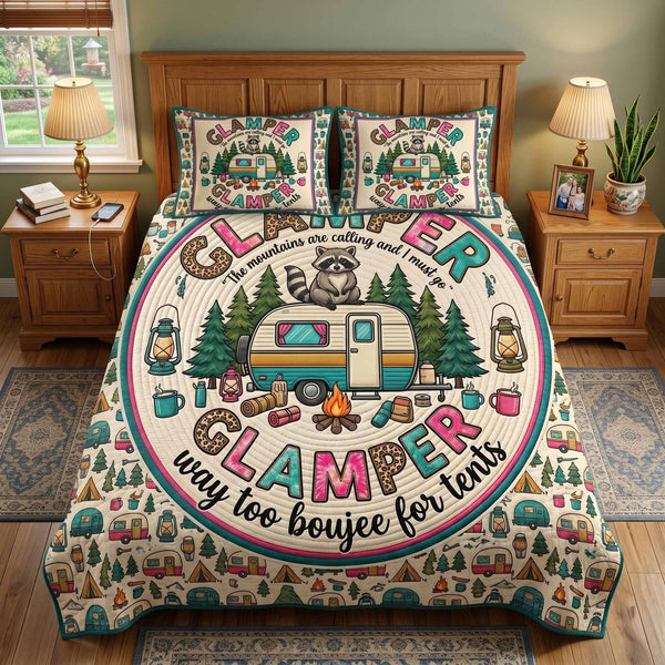 Glamper Queen quilted 3-piece bedding set on a made bed with two matching pillow shams