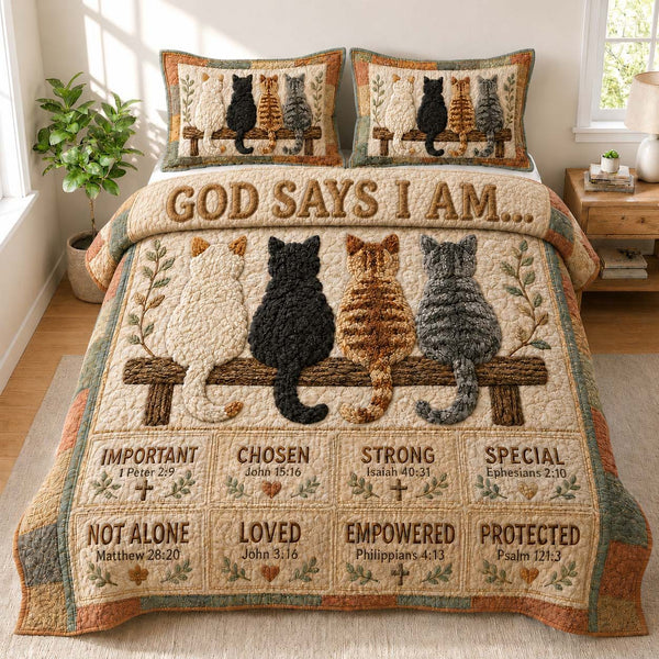 God Says I Am Cat Family quilted 3-piece bedding set on a made bed in a softly lit bedroom