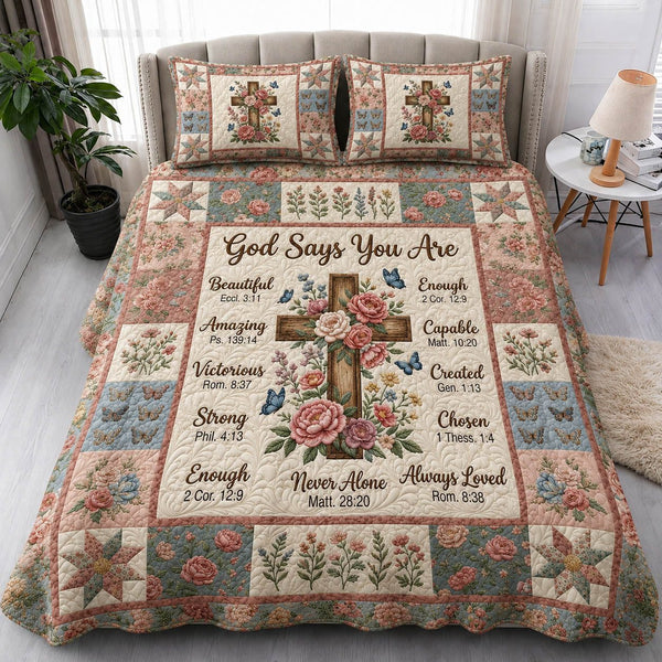 God Says You Are quilted 3-piece bedding set on a made bed in a softly lit bedroom