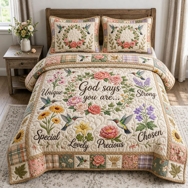 God Says You Are quilted 3-piece bedding set on a made bed in a softly lit bedroom