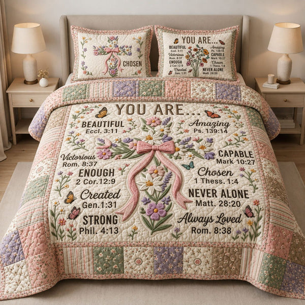 God Says Your Are quilted 3-piece bedding set on a made bed in a softly lit bedroom