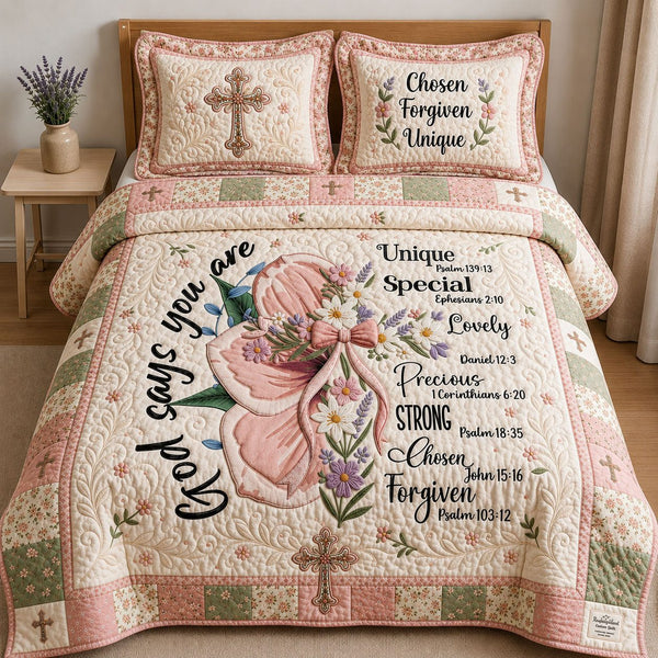 God Says Your Are quilted 3-piece bedding set on a made bed in a softly lit bedroom