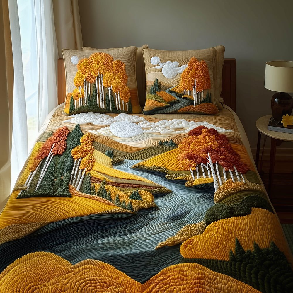 Golden Birch quilted 3-piece bedding set on a made bed with two matching pillow shams