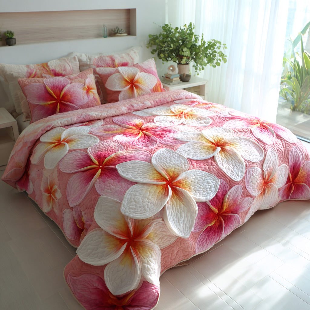 Hawaiian Bloom quilted 3-piece bedding set on a made bed with two matching pillow shams