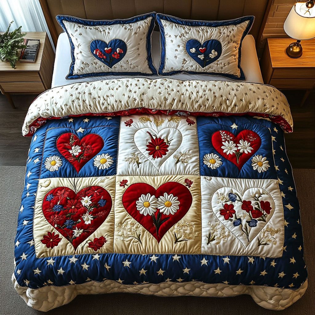 Heartland Bloom quilted 3-piece bedding set on a made bed with two matching pillow shams