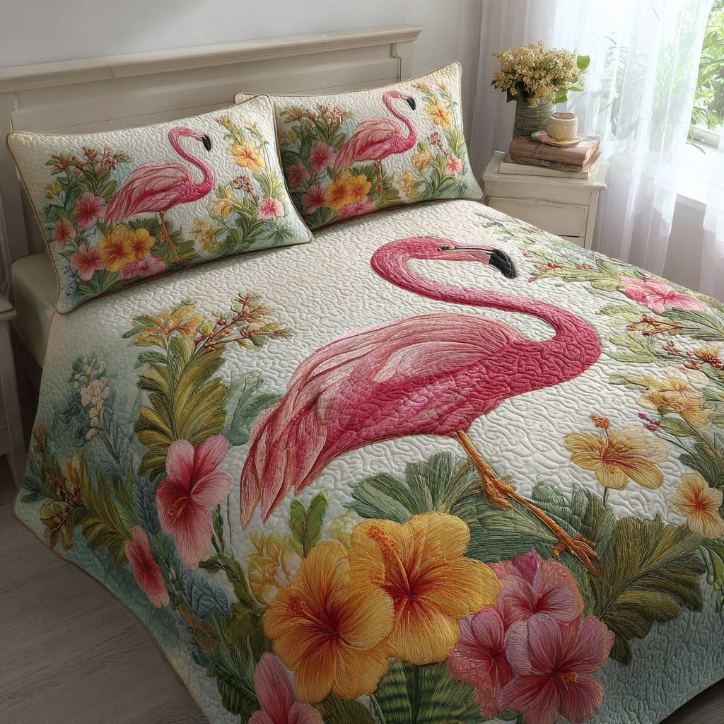 Hibiscus Flamingo quilted 3-piece bedding set on a made bed with two matching pillow shams