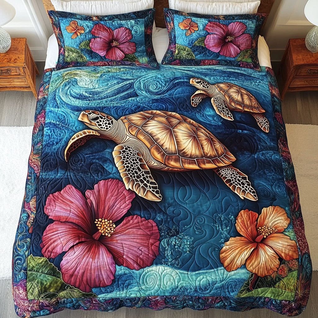 Hibiscus Journey quilted 3-piece bedding set on a made bed with two matching pillow shams