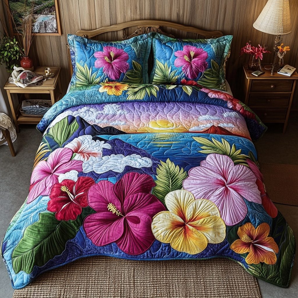 Hibiscus Sunset quilted 3-piece bedding set on a made bed with two matching pillow shams