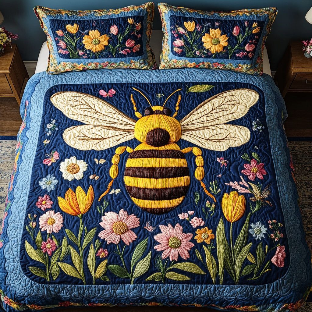 Honey Whisper quilted 3-piece bedding set on a made bed with two matching pillow shams