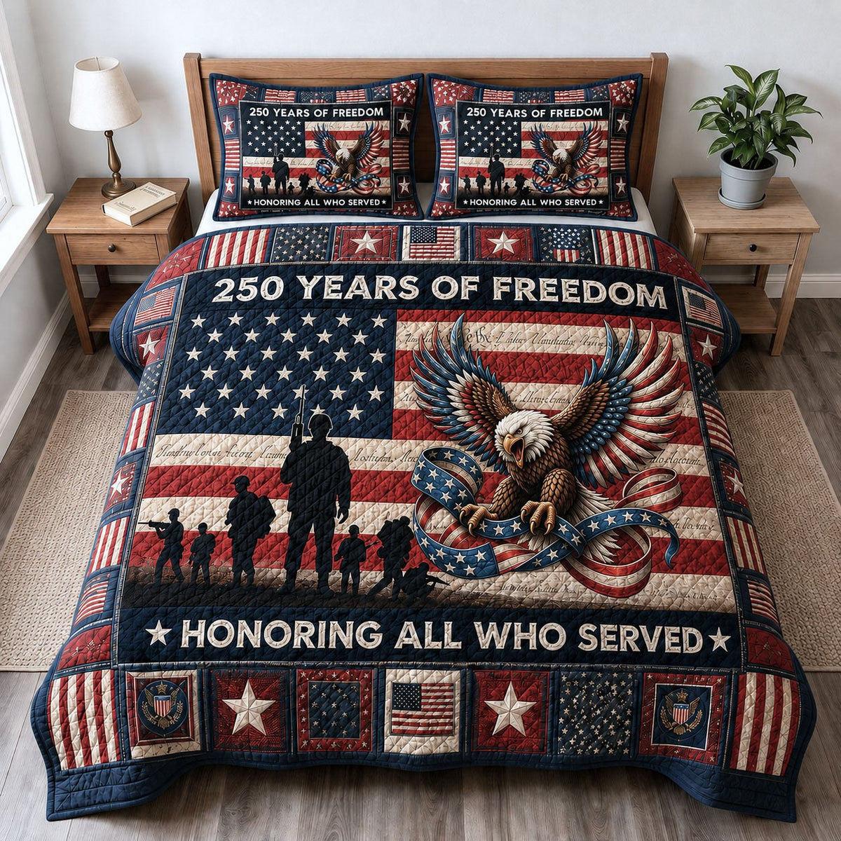 Honoring All Who Served quilted 3-piece bedding set on a made bed with two matching pillow shams