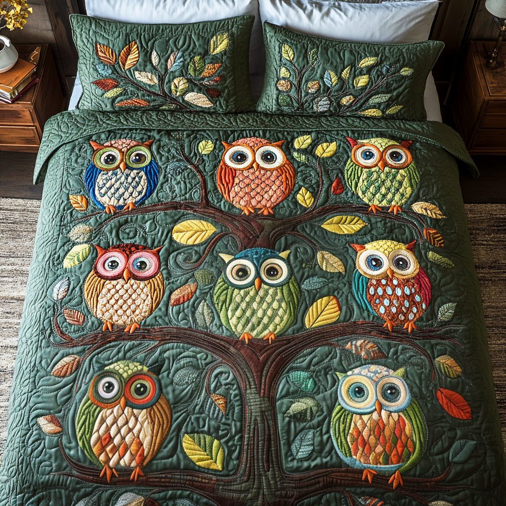 Hoot Harmony quilted 3-piece bedding set on a made bed with two matching pillow shams