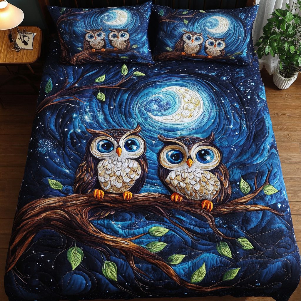 Hoots of Love quilted 3-piece bedding set on a made bed with two matching pillow shams