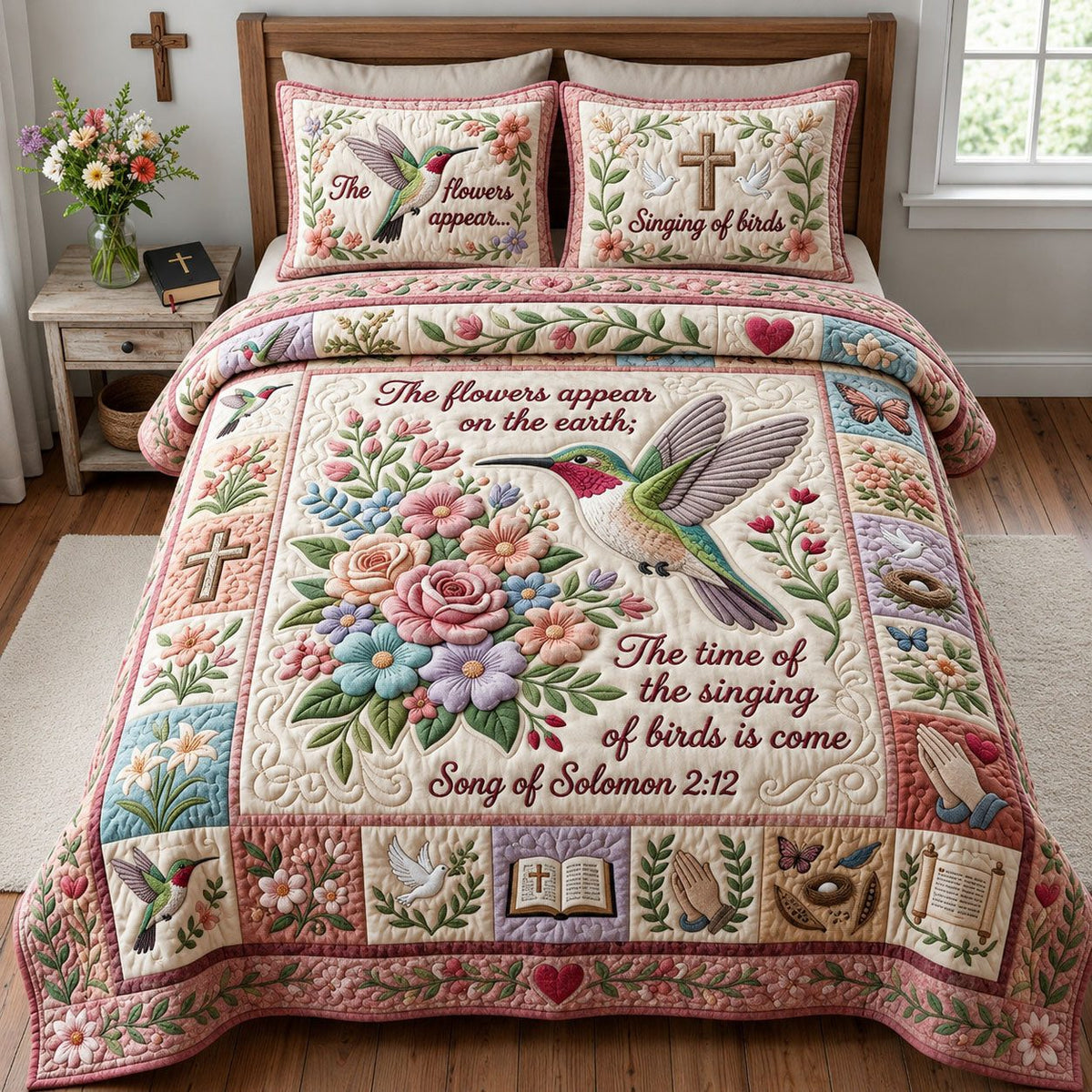 Hummingbird Floral Christian quilted 3-piece bedding set on a made bed in a softly lit bedroom