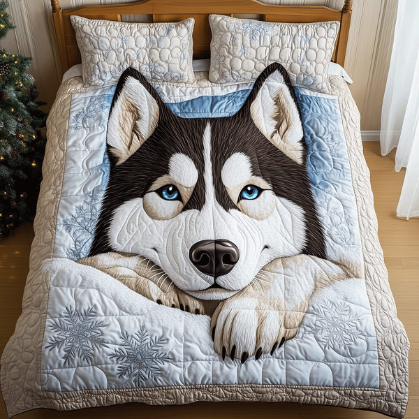 Husky Snowfall Dreams quilted 3-piece bedding set on a made bed with two matching pillow shams