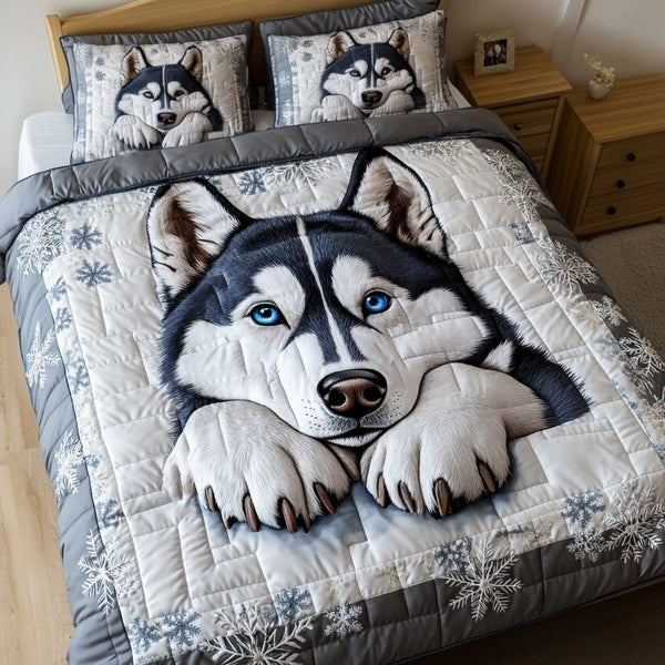 Husky Trail quilted 3-piece bedding set on a made bed with two matching pillow shams