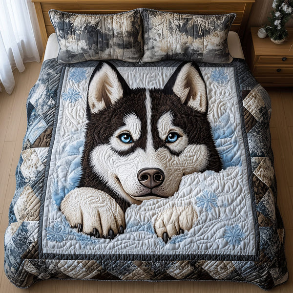 Icy Husky Trails quilted 3-piece bedding set on a made bed in a winter-styled bedroom