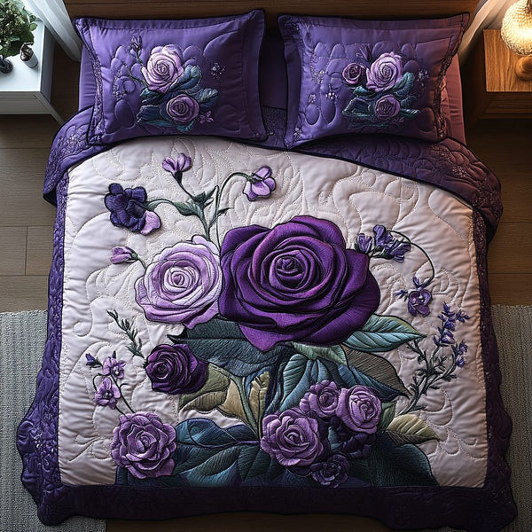 Indigo Blossom Dream quilted 3-piece bedding set on a made bed with two matching pillow shams