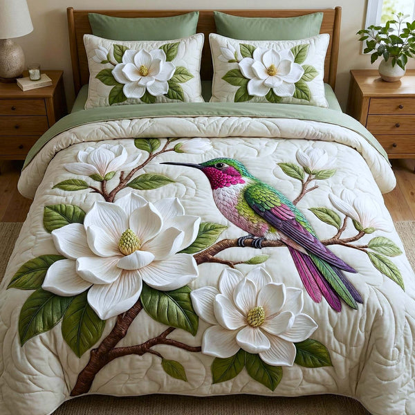 Iridescent Drift quilted 3-piece bedding set on a made bed with two matching pillow shams