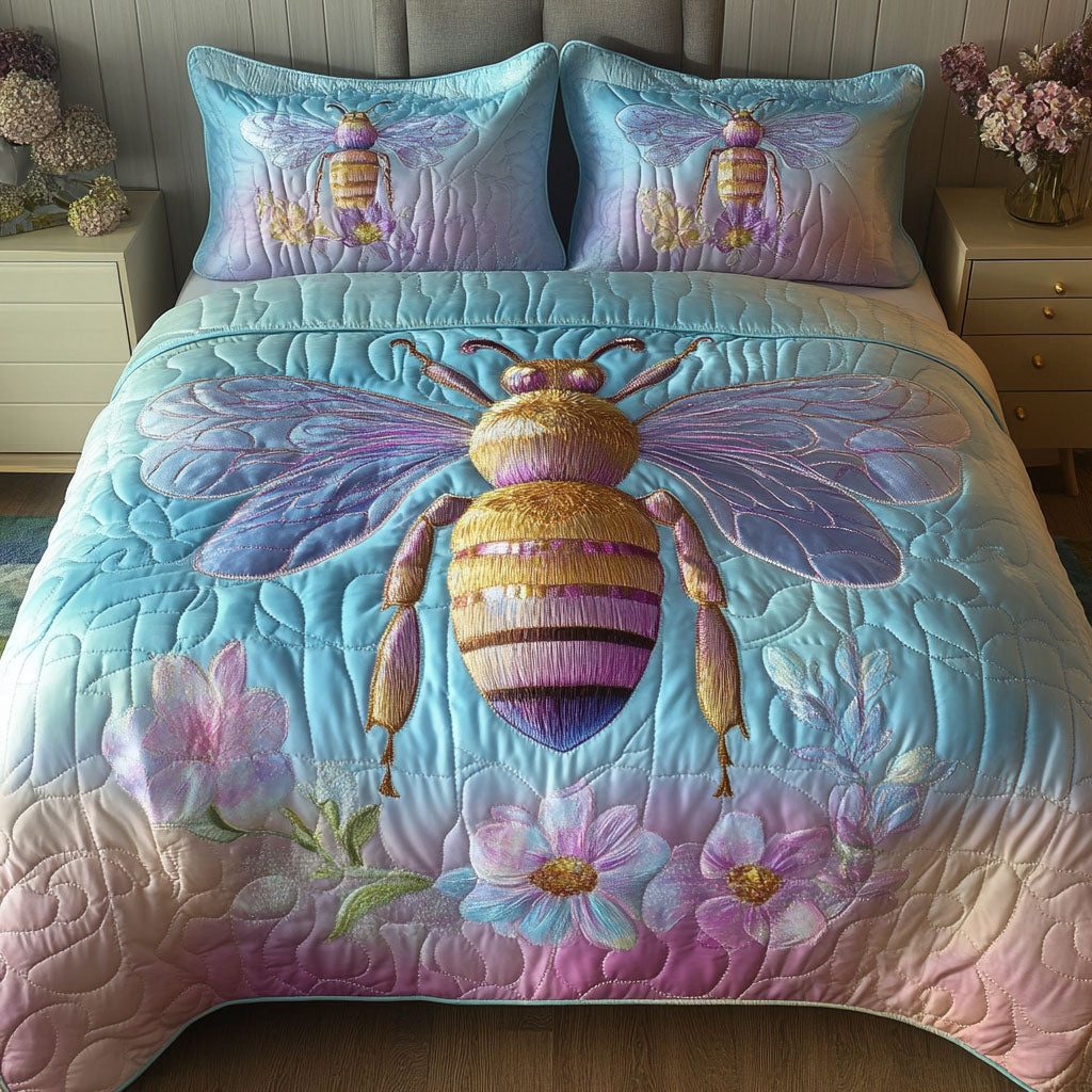 Iridescent Garden Bee quilted 3-piece bedding set on a made bed with two matching pillow shams