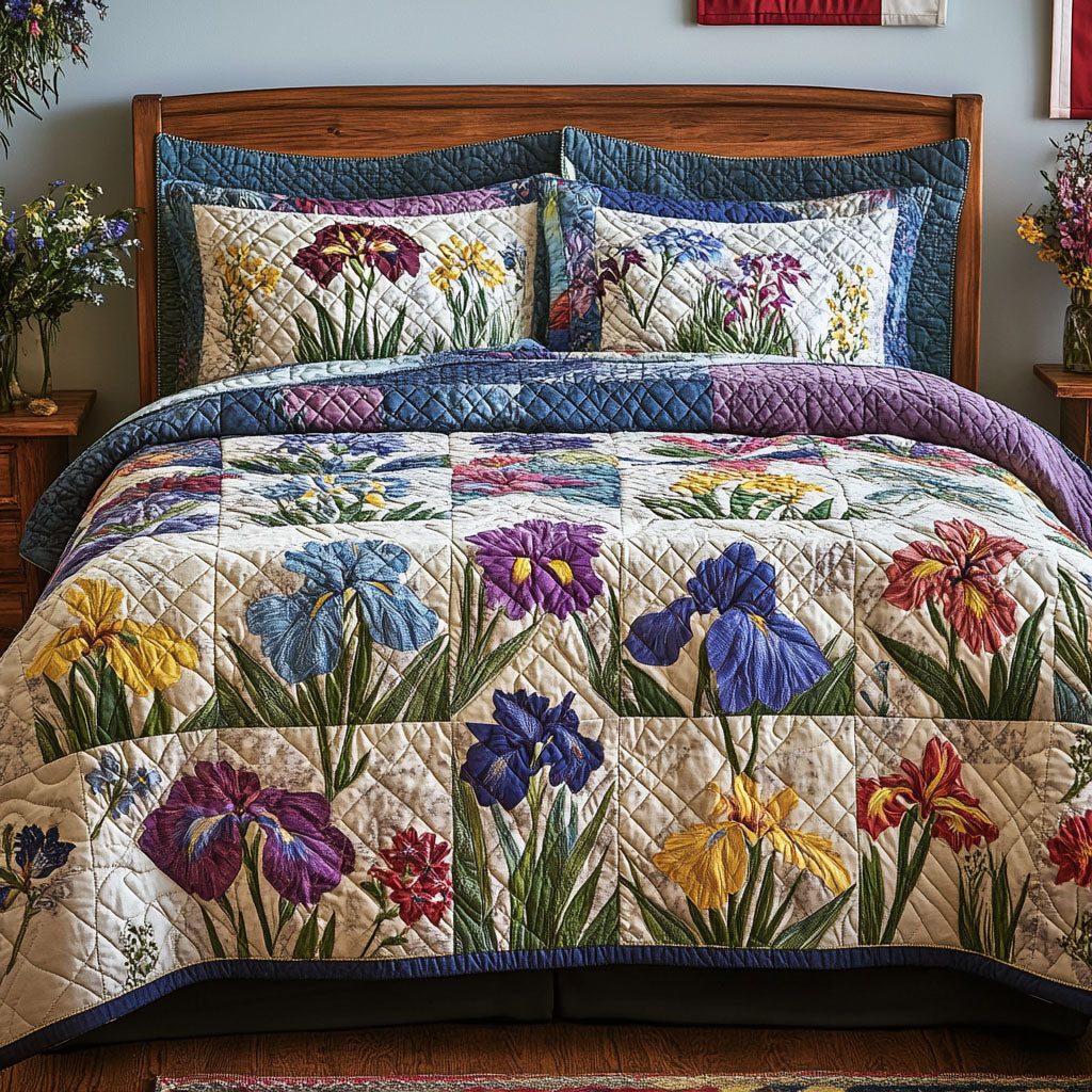 Iris Delight quilted 3-piece bedding set on a made bed with two matching pillow shams