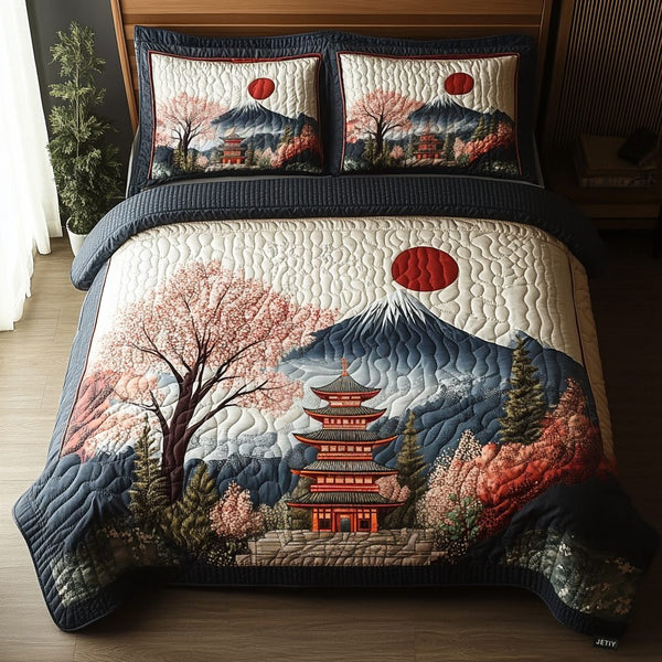 Japanese Pagoda Delight quilted 3-piece bedding set on a made bed with two matching pillow shams