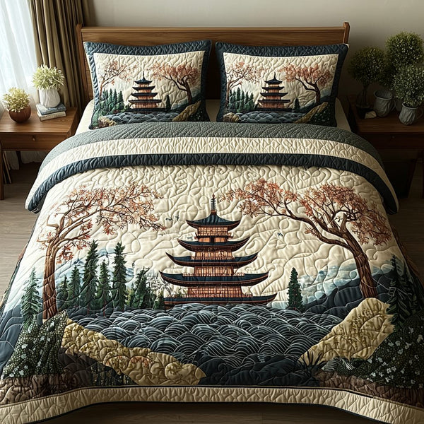 Japanese Pagoda Forest quilted 3-piece bedding set on a made bed with two matching pillow shams