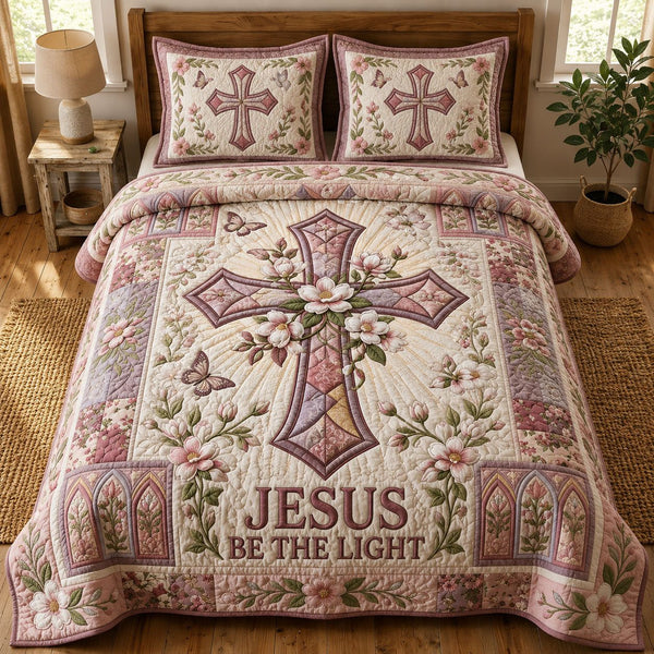 Jesus Be The Light quilted 3-piece bedding set on a made bed in a softly lit bedroom