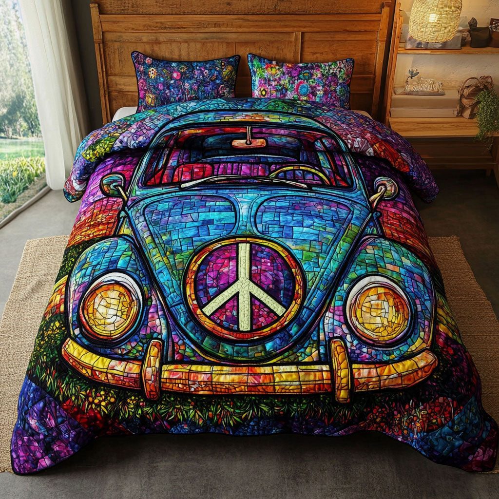 Joy Ride Nights quilted 3-piece bedding set on a made bed with two matching pillow shams