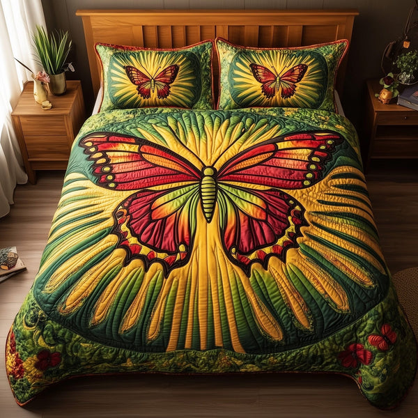Juneteenth Butterfly quilted 3-piece bedding set on a made bed in a warmly lit bedroom