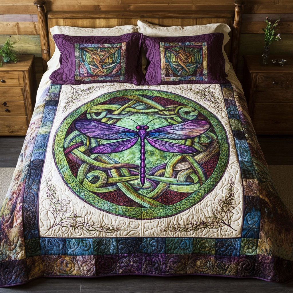 Knotted Wings quilted 3-piece bedding set on a made bed with two matching pillow shams