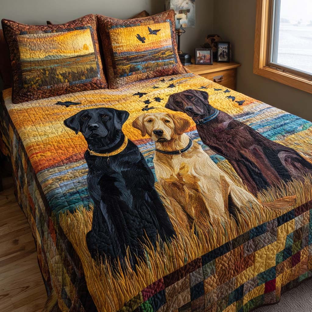 Lab Pursuit quilted 3-piece bedding set on a made bed with two matching pillow shams