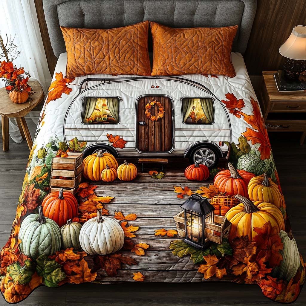 Lantern Glow Camper quilted 3-piece bedding set on a made bed with two matching pillow shams