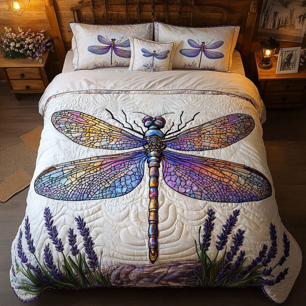 Lavender Breeze Escape quilted 3-piece bedding set on a made bed with two matching pillow shams