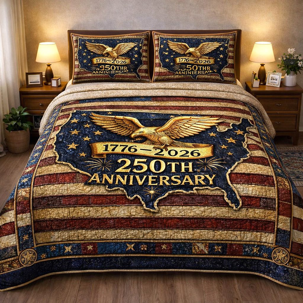 Liberty Legacy quilted 3-piece bedding set on a made bed in a warmly lit bedroom